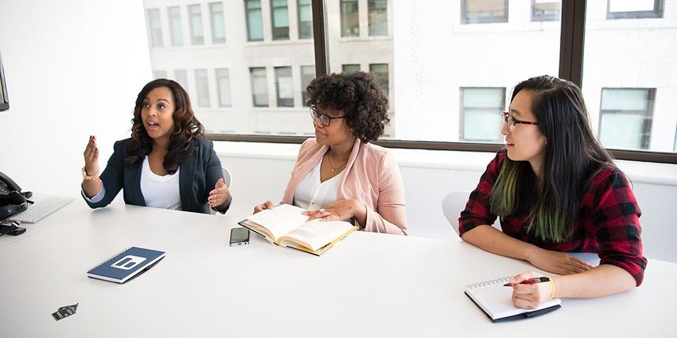 Business women talking in meeting